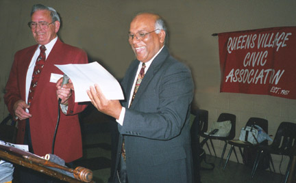 President Ramgarib receiving an award from Treasurer Mooney