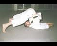 Matthews sensei - legs over upper back and neck stretch