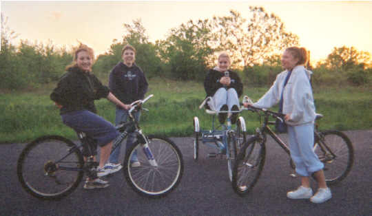 us on bikes waiting for boys