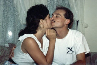 A laughing kiss.