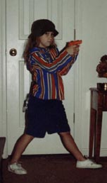 Future police woman. I love the stance and the handcuffs hanging from her back pocket.
