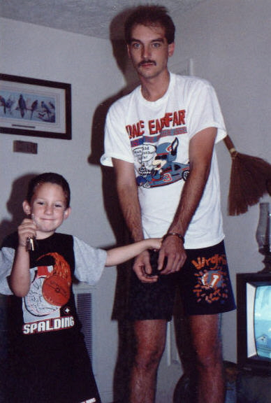 Handcuffed! Tim in handcuffs and Michael holding the key! Notice the look of satisfaction on Mike's face.
