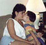 Michael giving Mommy sugar's, actually I think he was trying to break my nose! I don't get sugars like this anymore, he's too grown up for that now.