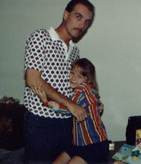 Amanda's birthday. Hugging Tim for the Barbie he got her. I wish she was so easy to please now!