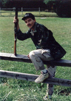 Crossing the fence on one of many of our "hunting" trips, I love this picture of Tim.
