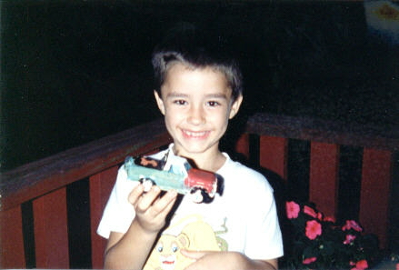 Josh, so proud of his truck he found.