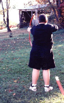 Sammy shooting the bow his Uncle Jesse gave him.