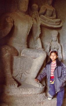 The silent stonny cave God blesses Sudarshana as she touches his feet