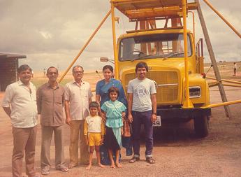 With launching truck as backdrop, researchers assemble for a snap