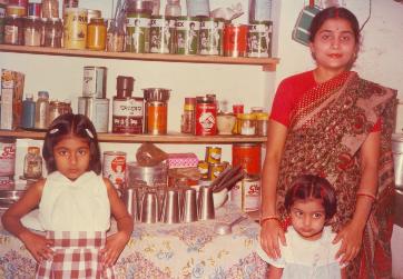 Rachana Das with 2 beautiful daughters in her efficient kitchen