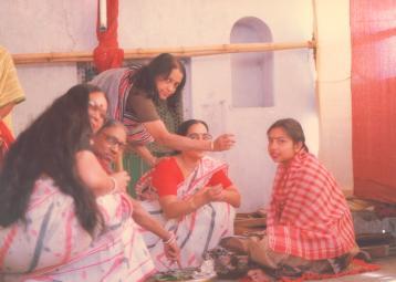 Enthuastic seniors perform tumeric bath on Reshmi