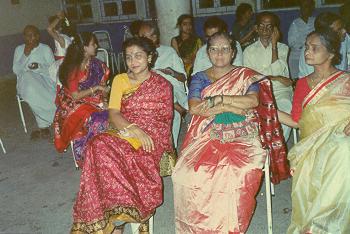 Rachana waiting in 1st row for dinner at marriage party