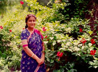 Mrs Rachana Das in her hibiscus gerden