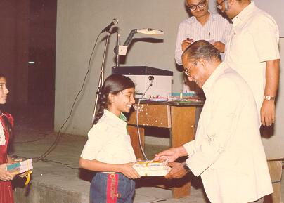 Prof. Raghava Rao distributes prizes to children