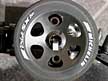 Easy access to adjustment screws through the wheels