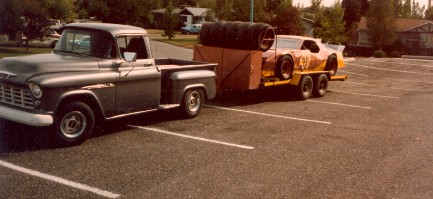 '55 Chev pickup towing '85 Firebird short track sportsman racer