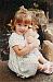 Young girl with doll