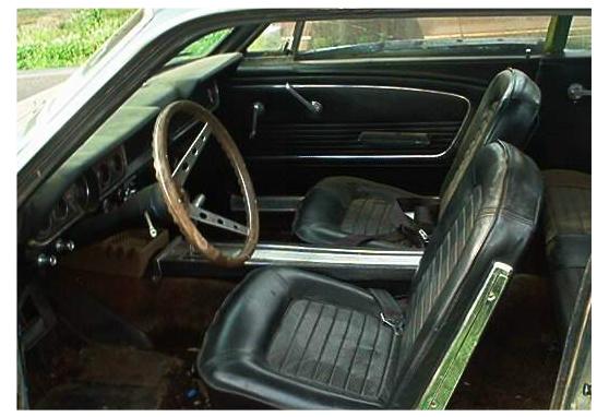Inside of 6cyl. Mustang, good interior, black.
