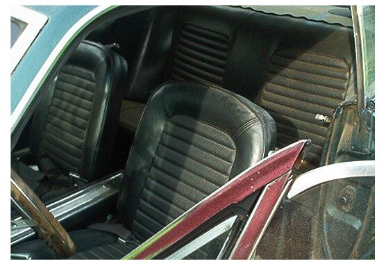 inside of 6cyl. Mustang, black interior.
