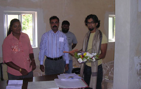 being felicitated at the local village panchayat for the snake rescue services provided over the years