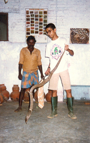 Rahul learns to handle a cobra with a member of the irula tribe  Sampat