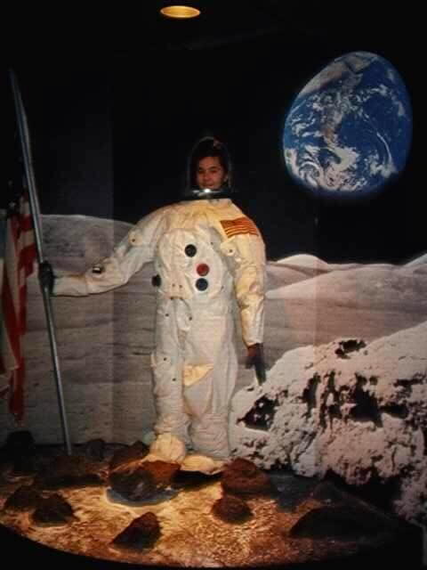 I am in an astronaut suit at Kennedy Space Center