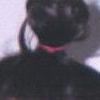 With my hair tied up before shaving. Renee thought this was amusing.