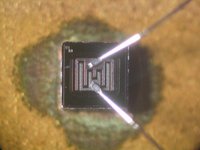 Die of a KSY34 high-frequency NPN transistor, base and emitter connected via bonded wires