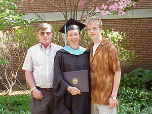 Dad, Mom, and Handsome self back in May.