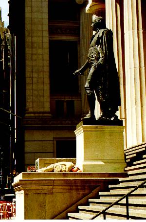 Wall St man sleeping.jpg (31219 bytes)