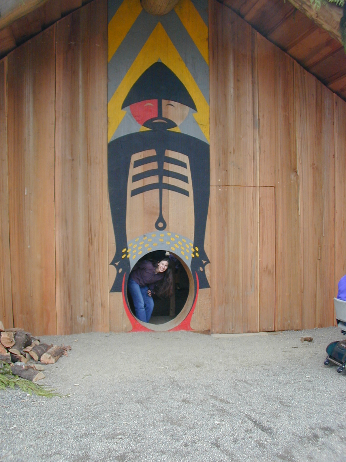 Me at a longhouse entrance.