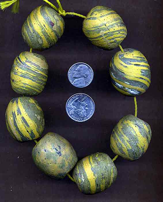 strand of large yellow swirl beads