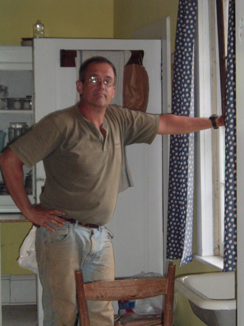 Dad fixing the kitchen window