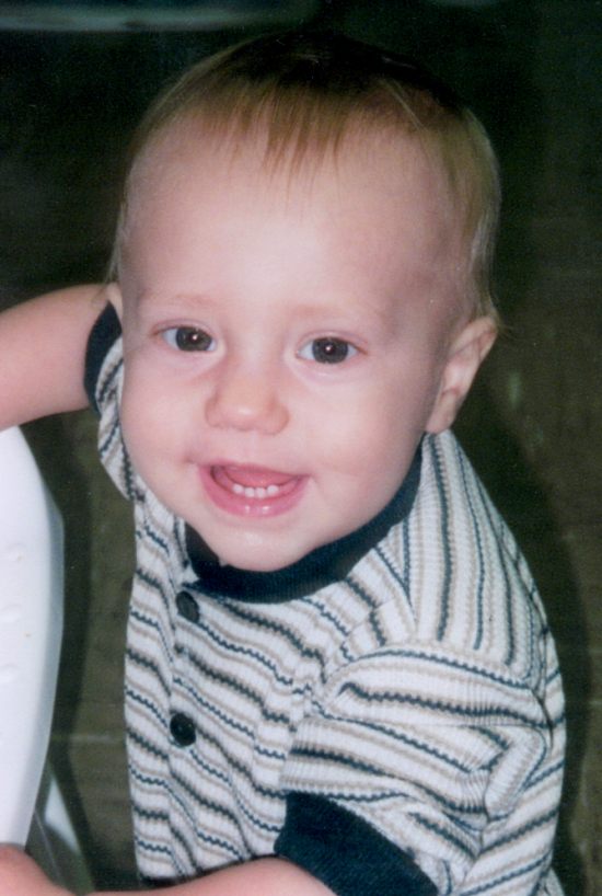 Bond-4-01-Standing-up-at-highchair-closeup.jpg (1025652 bytes)