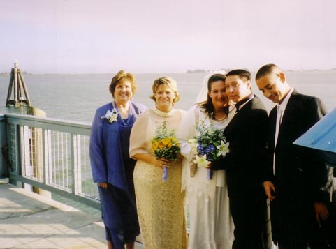 Mom, bridesmaid, us, and my brother, Antonio