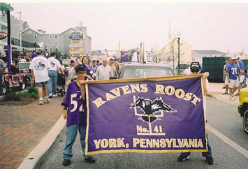 Roost #41 members begin their parade walk down Baltimore Street.
