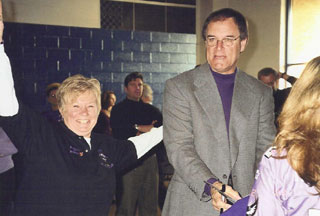 Roost #41 member Peggy Brandt celebrates with Ravens Head Coach Brain Billick