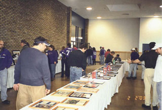 Bidders reviews the items at the Silent Auction