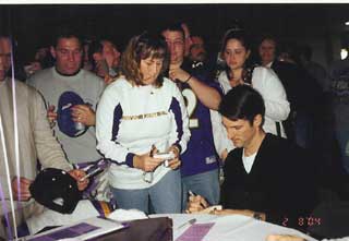 Ravens place kicker Matt Stover signs autographs at Bullroast 2004.