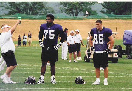 OT Jonathan Ogden and TE Todd Heap watch the drills.