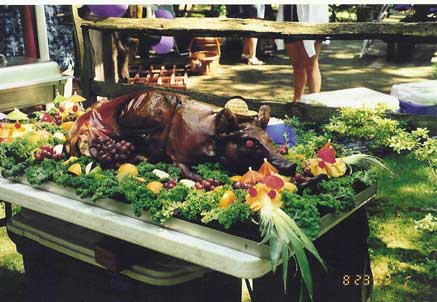 Introducing the main course - a roasted pig with all the trimmings.