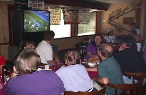 Roost members celebrate the victory again at the 'Super Bowl in July' party at the Cove