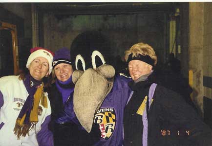 Peggy Brandt, Wendy Einsig and Roost #41 President Joyce Berkheimer celebrate with Poe.