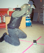 He prefers using a big shovel to disarm the bomb... shhh, expert at work