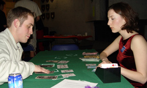 Petra dealing out the cards and getting ready to grab this poor guy's money...