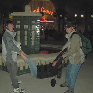 We were bored, there was a fountain.... and an unwitting victim once again :) Everyone into the pool! The water's great!
