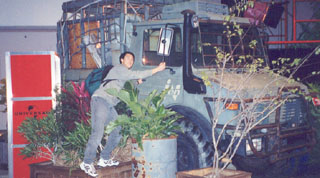 My brother sneaking into one of the Jurassic Park cars