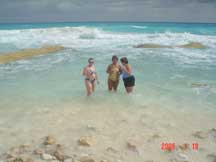 The women are getting wet - with drinks in hand!