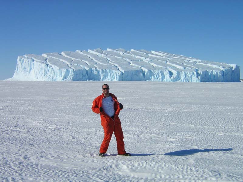 Showing off near an Iceberg on the Sea Ice near Mawson Station, Antarctica