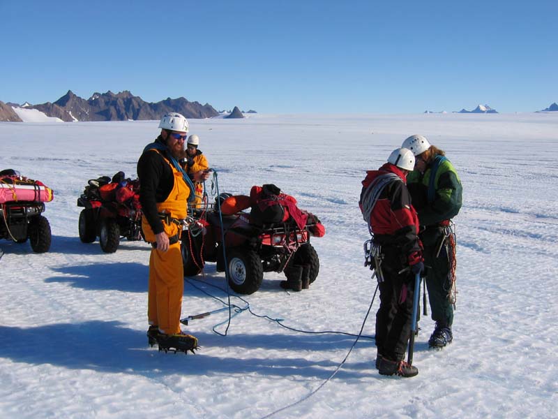 Roping up for glacier travel, Ice Plateau, East Antarctica
